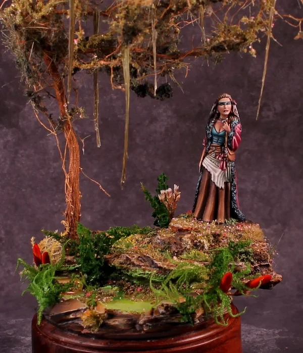 The base creates the scene for the Witch