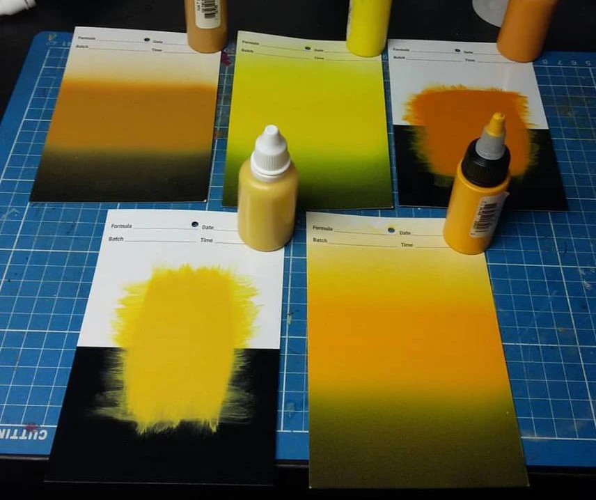 Some airbrushed samples and some hand brushed samples as well as the bottles of wet samples to send back to the manufacturer.